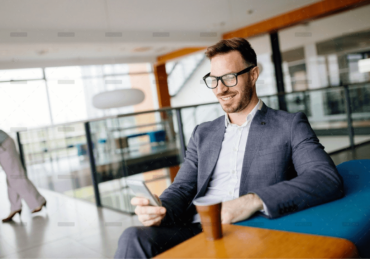 demo-attachment-478-businessman-taking-a-break-with-a-cup-of-coffee-JW4B3DH